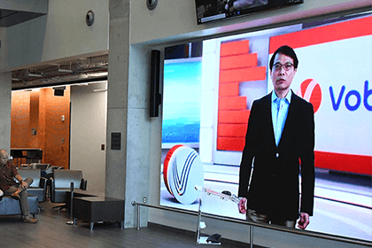 Yangbin Wang (MSEE, ’93), CEO of Vobile, speaking virtually at the announcement of the opening of a new R&D and Operations Center in Gainesville