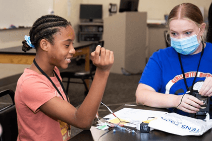 Campers at the Girls with Nerve summer camp applied electrodes to their arms to send weak signals to their nerve cells. This experiment demonstrated what happens when there is too much stimulation, causing the brain to respond in a different way.
