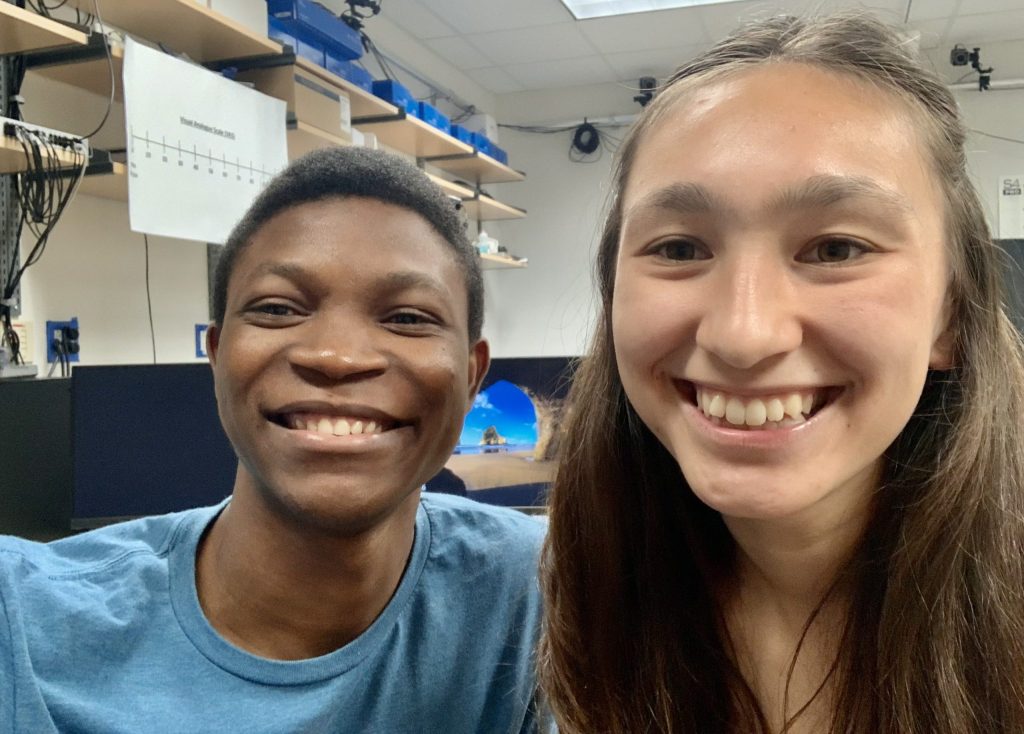 Biomedical Engineering graduate student, Victor Elikem Akpaloo, and undergraduate student, Izabela Zmirska.