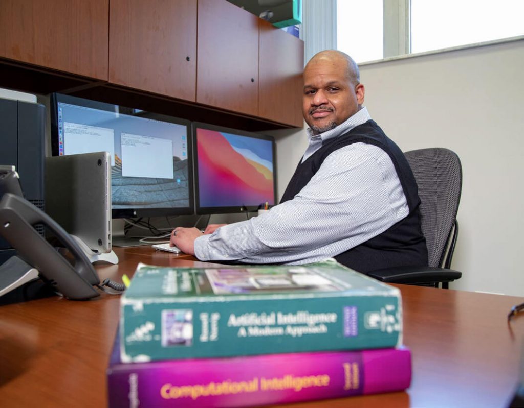 Damon Woodard, Ph.D., in his office on UF's campus