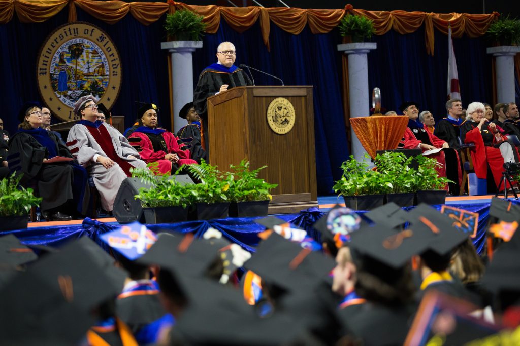 Josh Walden addresses graduates at UF engineering ceremony.