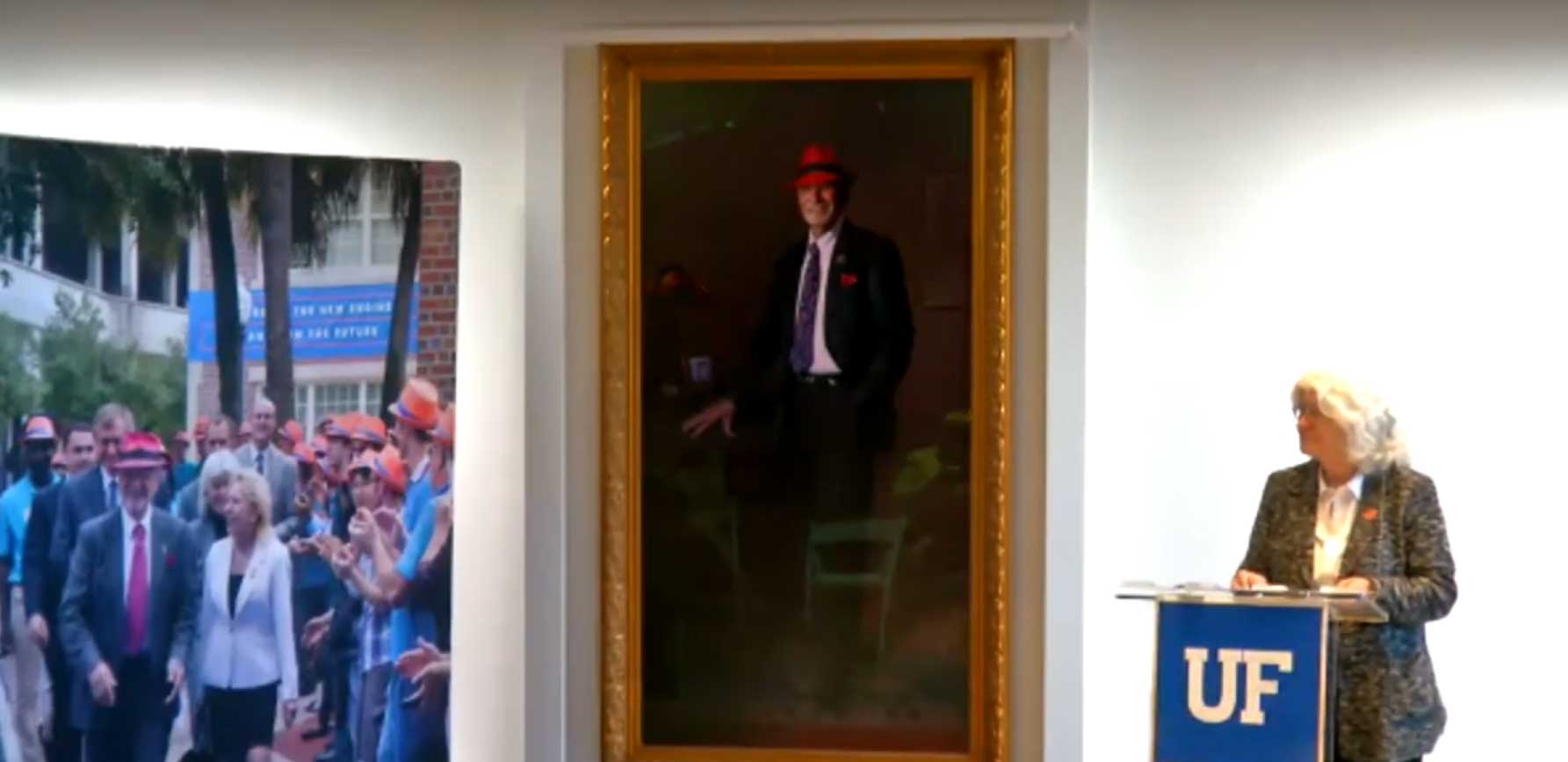 Screen capture of video taken at the unveiling of Herbert Wertheim's portrait