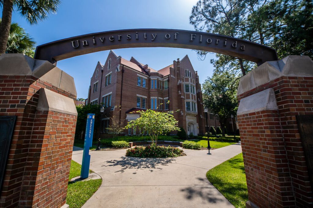 Photograph of UF's main entrance at the corner of University Ave and 13th Street