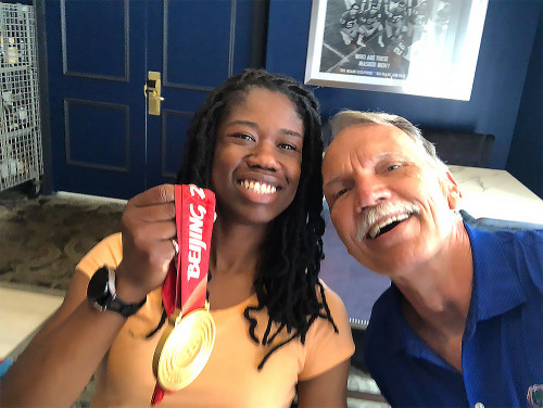 Erin Jackson poses with MSE Graduate Coordinator and Distinguished Professor Kevin Jones.