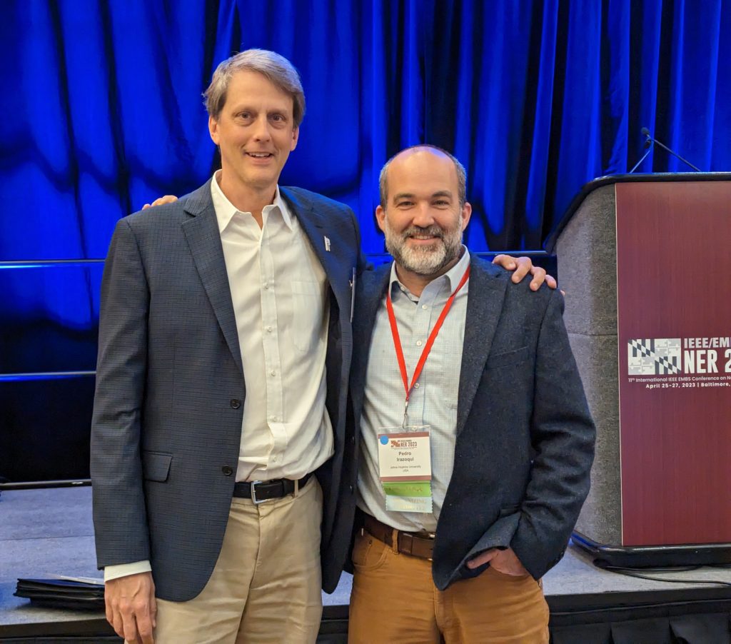 Prof. Jack Judy (UF) congratulating Prof. Pedro Irazoqui (Johns Hopkins), who was the General Chair of the 2024 IEEE Neural Engineering Conference and is one of his former PhD students. 