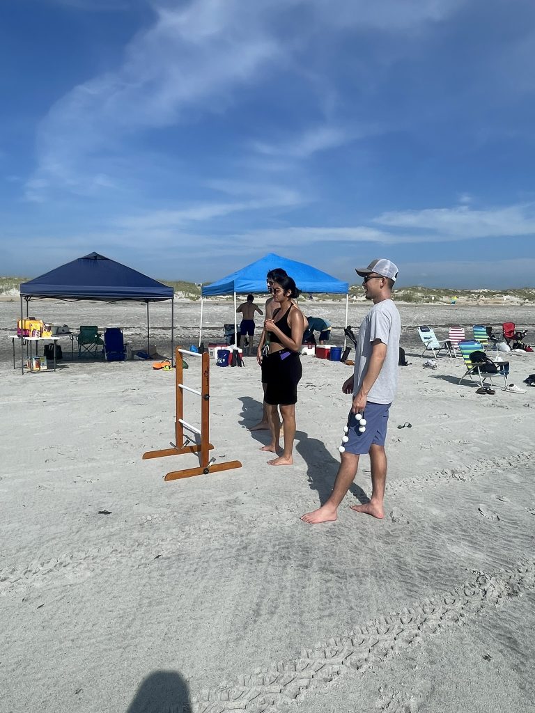 Student's observing others play ladder golf. 