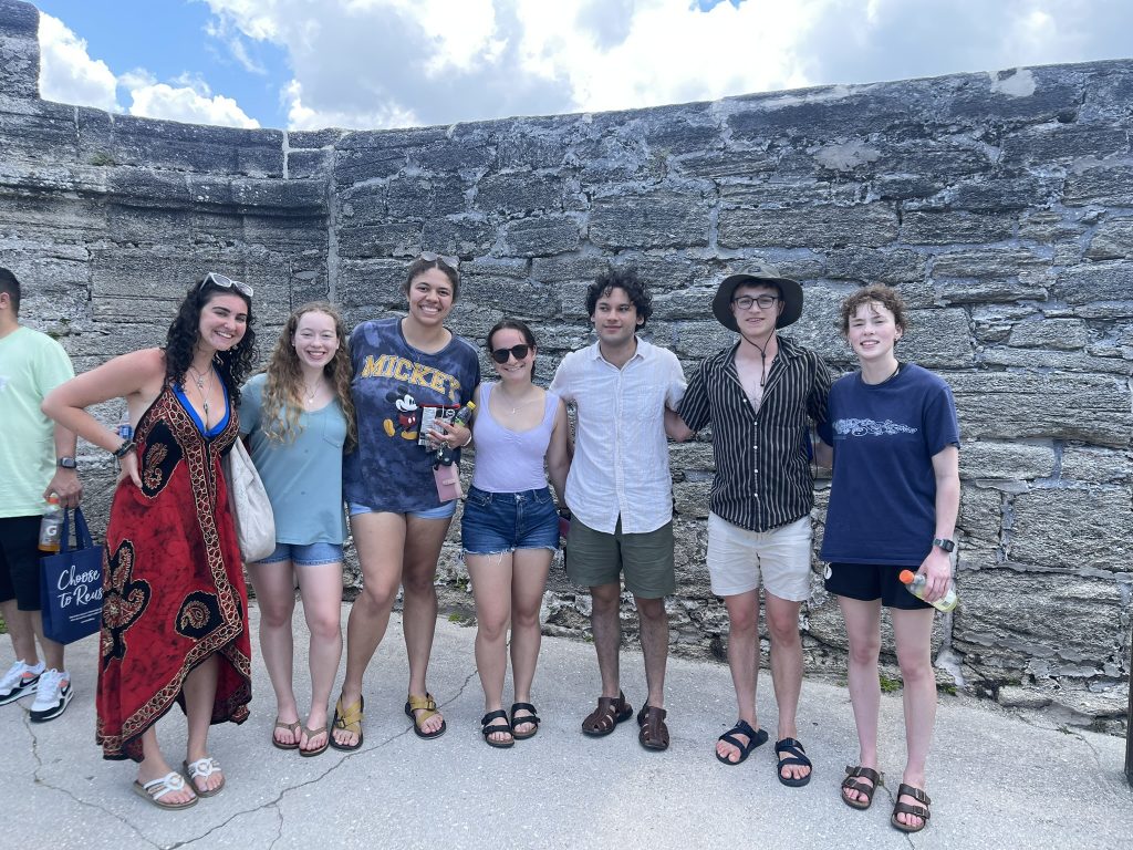A group of students posing and smiling for a photo.