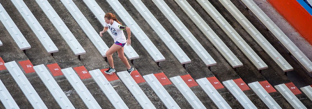 Self care resources - photograph of a runner doing stadiums at Ben Hill Griffin Stadium
